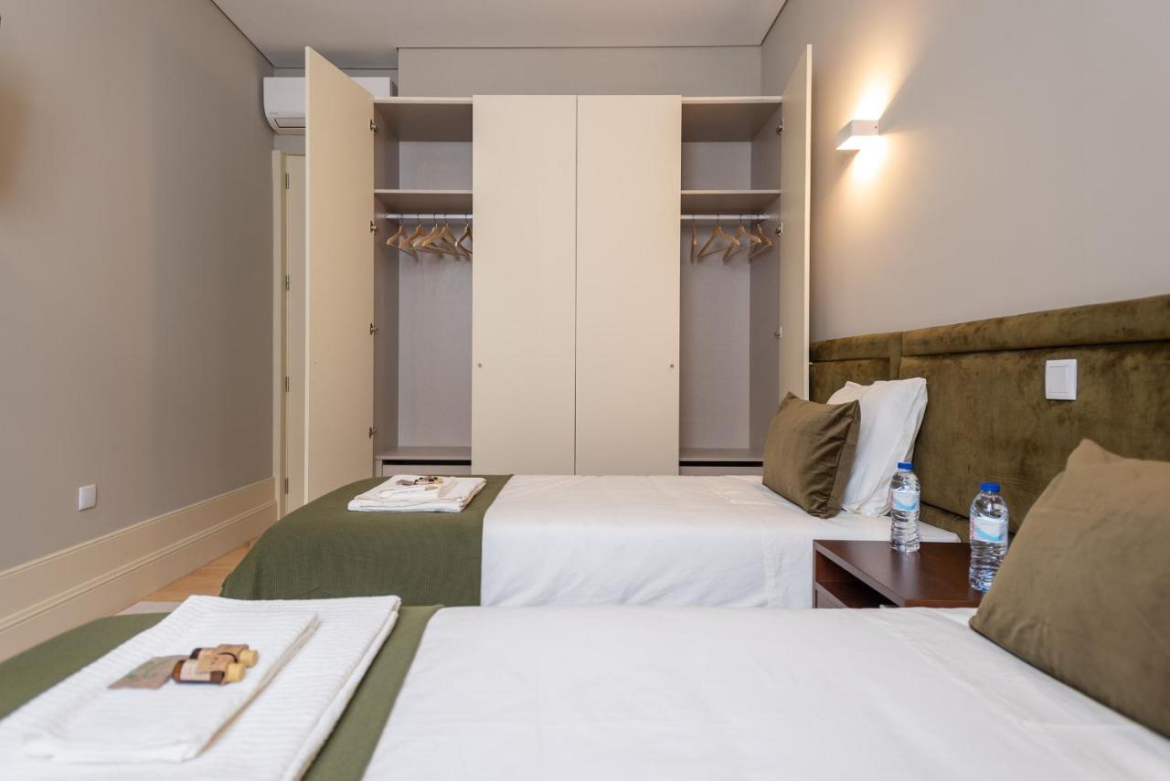 Cc Downtown Palace - H Porto Bagian luar foto